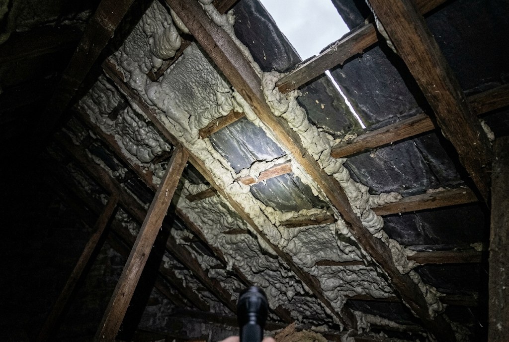 Foam under roof tiles in a Blacon house.